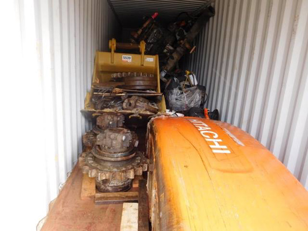 Heavy machinery taken apart to fit in a container